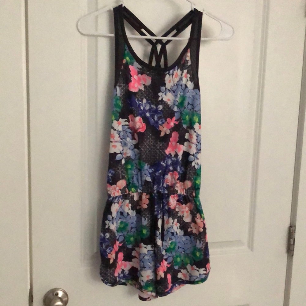 floral athletic/casual jumpsuit by Ideology. Size L but will fit S and M.